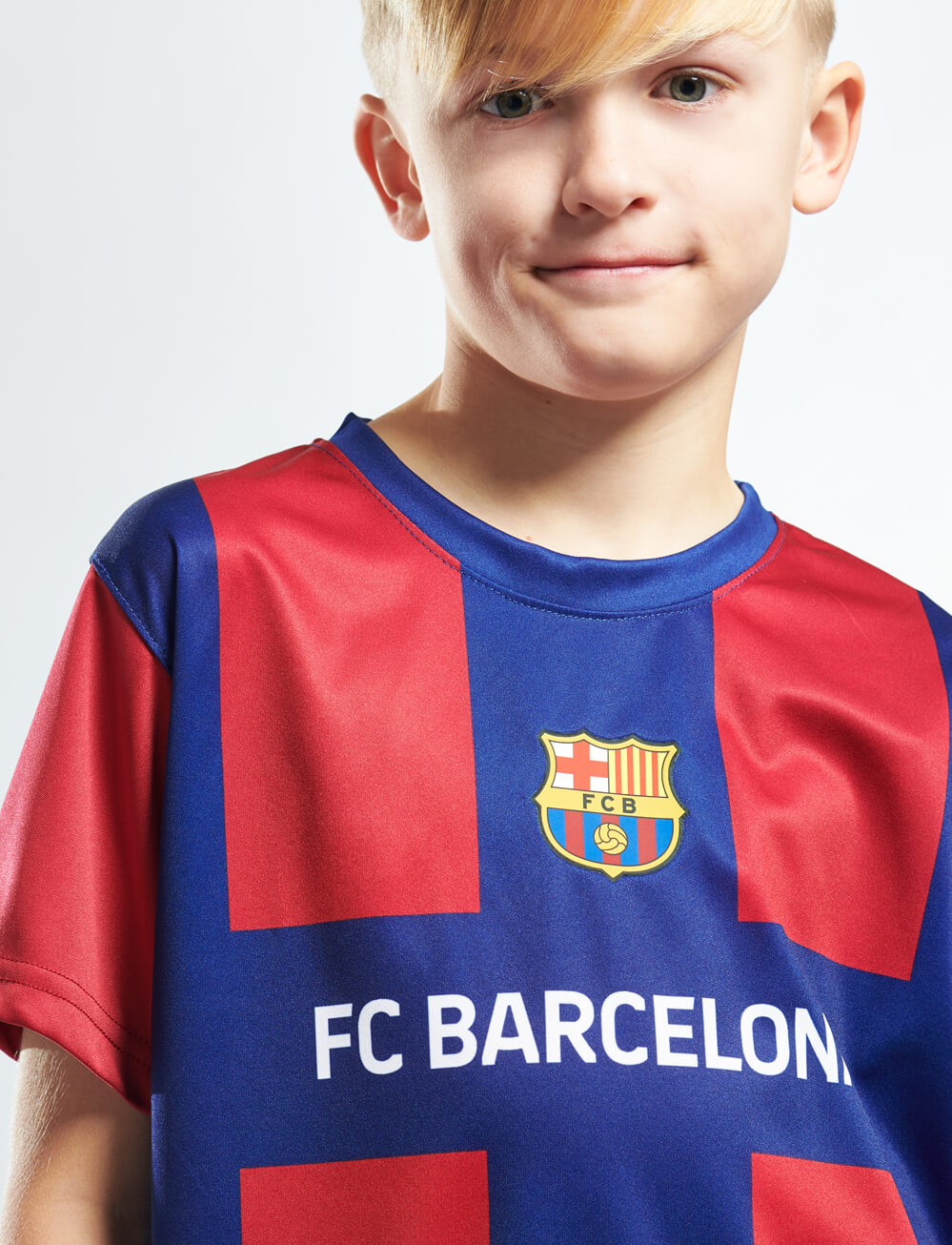 Official FC Barcelona Kids 1st Team Kit - Navy/Red - The World Football Store