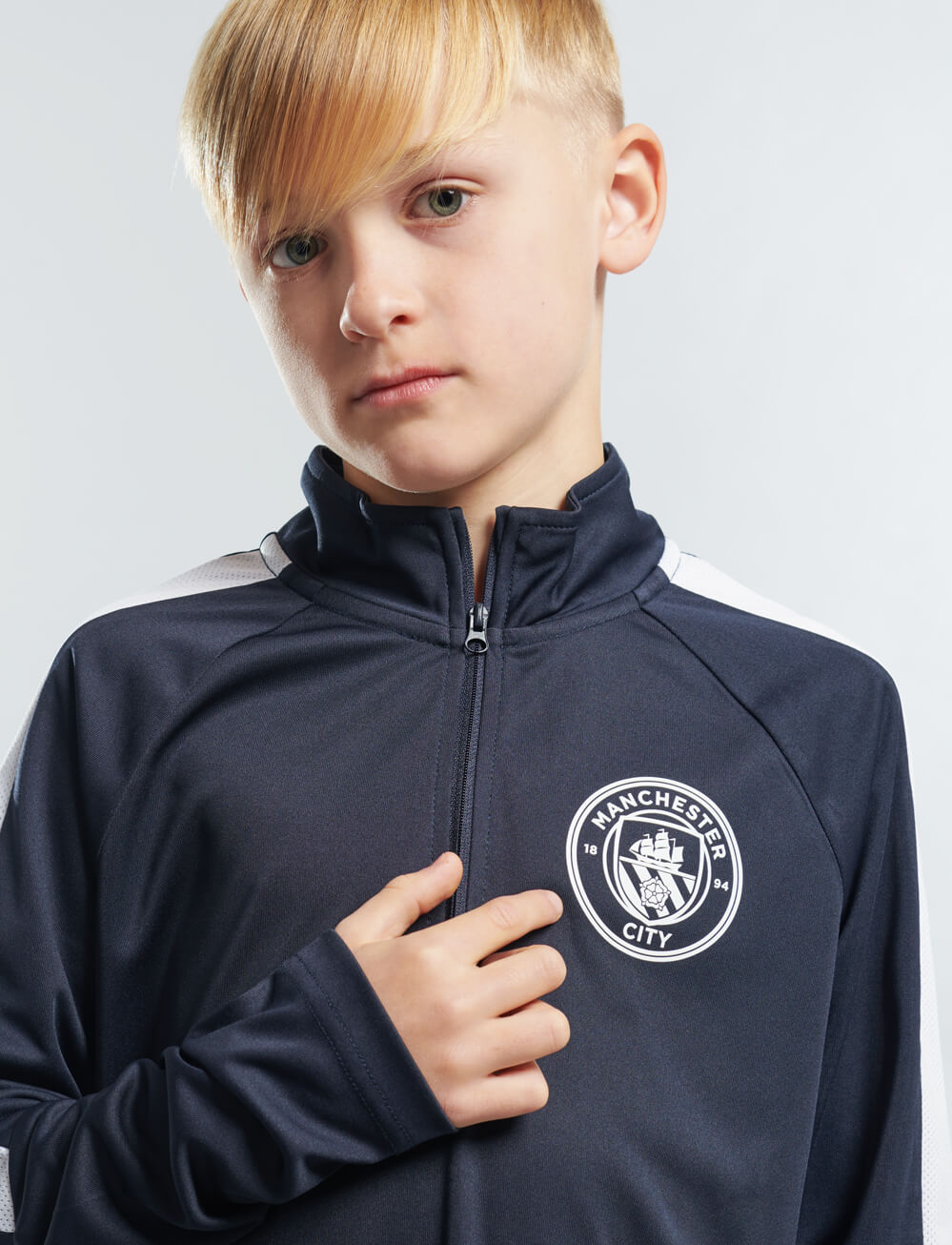 Official Manchester City Kids 1/4 Zip Track Top - Navy - The World Football Store